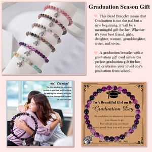 Natural stone beaded bracelet with ladybug charm on graduation gift card display
