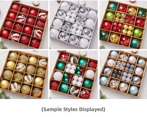 Detail view of 16 mixed texture Christmas ornaments in red, gold and green festive colors