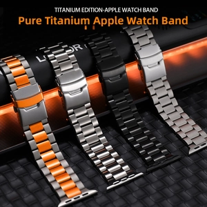 Detail of premium titanium three-link Apple Watch bands in silver, black and orange