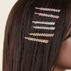 Sparkling rhinestone hair clip set in gold silver and rose gold worn on hair side
