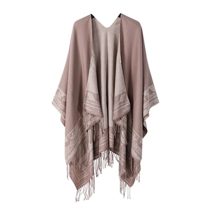 Brown double-sided stripe poncho with animal patterns and decorative fringes