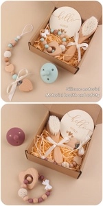 Baby gift set with beechwood teether, pacifier clip and wool hairbrush in a box