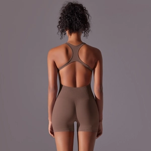 Detail of coffee brown seamless yoga bodysuit featuring high-stretch ribbed fabric and backless design