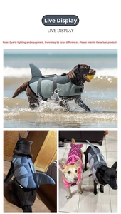 Detail of shark fin and mermaid dog life jacket with adjustable straps and secure handle