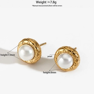 Detail of gold-tone quilted round stud earrings with pearls and weight measurements