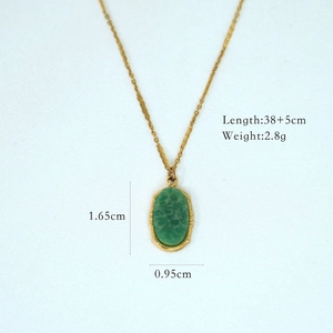 Detailed view of African jade necklace with dimensions 38+5cm length and 1.65cm pendant size