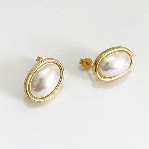 Elegant 925 sterling silver gold oval pearl stud earrings with a minimalist vintage look