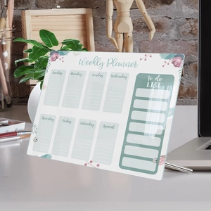 Weekly Planner Acrylic Board featuring floral patterns and a metal stand for office desks