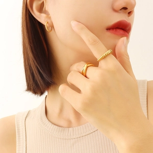 French style 18K gold plated spiral earrings and minimalist ring set on model
