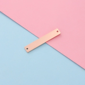 Detailed view of rectangle rose gold connector charm for custom engraving jewelry