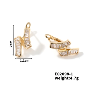 Detail showing dimensions of gold-plated earrings with rectangular zircon crystals
