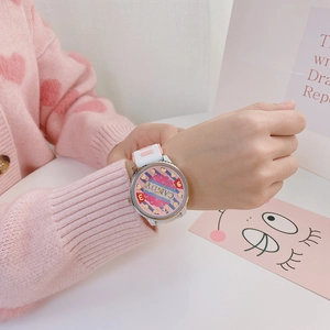 Close-up of a pink silicone strap quartz watch for girls with candy colored dial detail