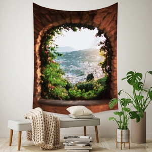 Detail of bohemian tapestry featuring an arch window view with lush plants and old town
