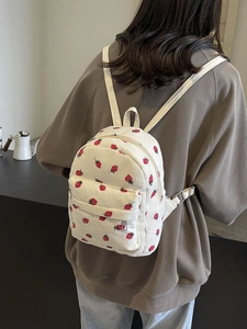 Corduroy beige backpack with red strawberry pattern and adjustable straps for women