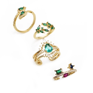Adjustable gold rings set featuring butterfly and vine designs with colorful zircons
