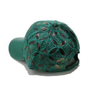 Detail view of vintage geometric leather baseball cap with adjustable metal buckle