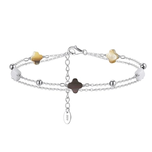 Detail of S925 sterling silver double-layer bracelet with colorful clover shell charms