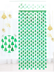 Detail of green metallic tinsel curtain with Christmas tree shapes for party backdrops