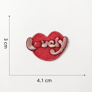 Detail of red lips embroidery patch with lovely text for phone case and bag decoration