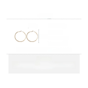 Detailed view showing dimensions and 5.2cm diameter of rose gold intertwined hoop earrings