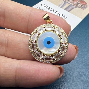 Exquisite golden shell evil eye pendant with blue zircon stones for jewelry making