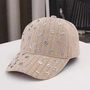 Khaki corduroy baseball cap with stylish silver metal letter rivets and adjustable fit