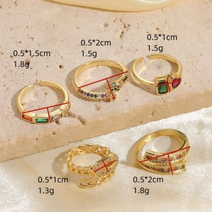 Five styles of 14K gold plated geometric rings with colorful cubic zirconia stones