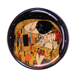 Artistic round brooch inspired by Gustav Klimt's The Kiss with vibrant colors on white background