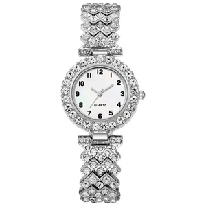 Elegant silver women's quartz watch with diamond-encrusted bezel and geometric strap
