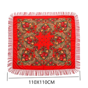 Detailed view of 110x110cm red ethnic square scarf with floral print and fringe edges