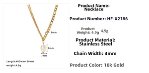 Detail view of 18K gold plated stainless steel double chain necklace with 9mm pearl
