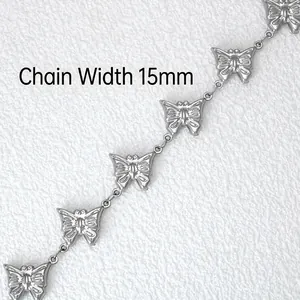 Detail of 15mm stainless steel butterfly link chain with engraved wings for jewelry DIY