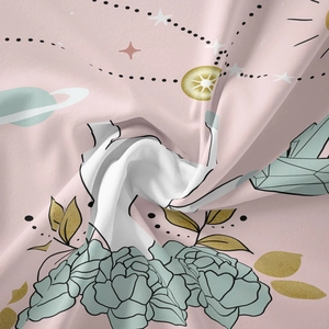 Close-up of bohemian constellation tapestry fabric with floral prints and starry patterns