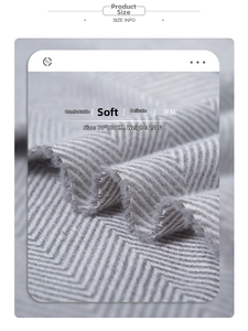 Detail view of grey herringbone scarf fabric measuring 70x180cm and weighing 250g