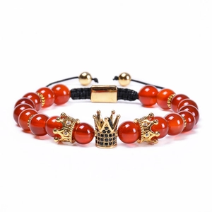 Red agate crown beaded bracelet set with gold cubic zirconia charms and black cord