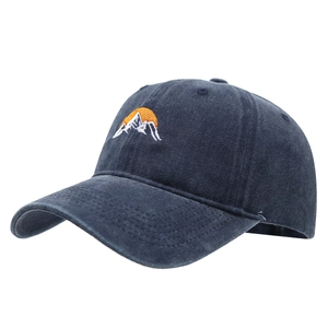Vintage navy blue cotton baseball cap with embroidered mountain sunrise pattern