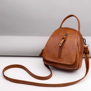 Brown vintage faux leather crossbody bag with multiple compartments and adjustable strap