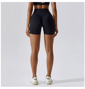 Rear view of high-waisted black yoga shorts with V-shaped seam for butt lifting effect