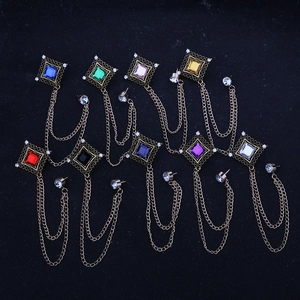 Vintage gold square gemstone brooches with hollow patterns and elegant fringe chains