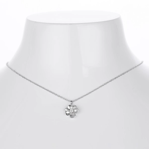 Detail of s925 silver flower pendant necklace with central zircon on model