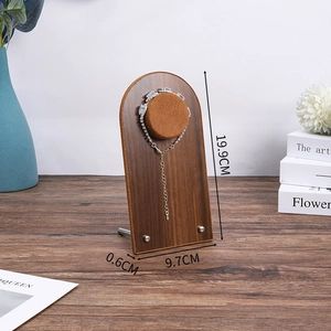 Macro view of walnut jewelry display stand showing 19.9cm height and 9.7cm width dimensions