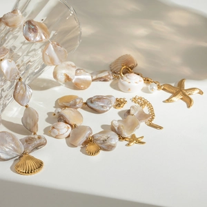 18k gold plated stainless steel ocean theme necklace and bracelet with shell and starfish