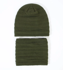 Detailed knit texture of olive green winter beanie and neck warmer scarf set