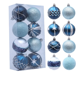 Detail of blue and silver Christmas ornaments with glitter, stripes and star patterns