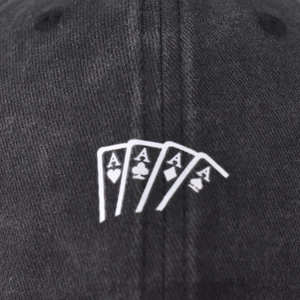 Washed black cotton baseball cap featuring embroidered four aces poker cards pattern