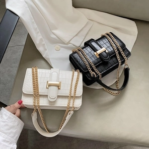 Elegant crocodile embossed chain shoulder bag in black and white leather finish