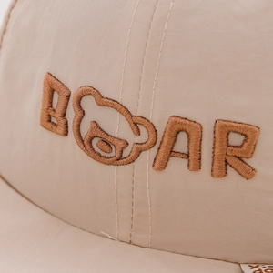 Beige baby quick-dry sun hat with 3D bear embroidery and soft texture for outdoor use