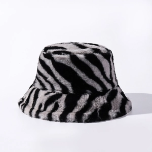 Close-up of zebra pattern plush bucket hat texture with soft black and grey faux fur
