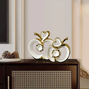 Modern nordic white ceramic apple sculptures with elegant gold plated floral detailing