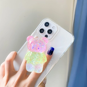 Support de téléphone ours mignon avec paillettes irisées roses et violettes sur smartphone